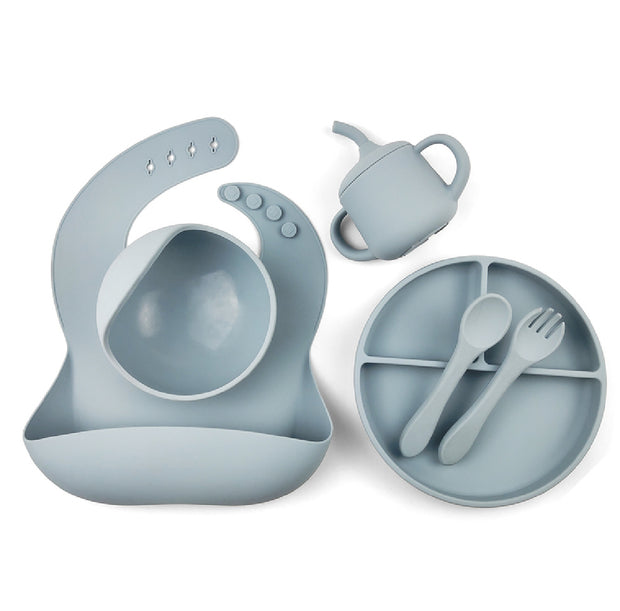 Esther silicone baby feeding set including a divided suction plate, bowl, bib with food catcher, sippy cup, spoon, and fork. Perfect for weaning and toddler feeding
