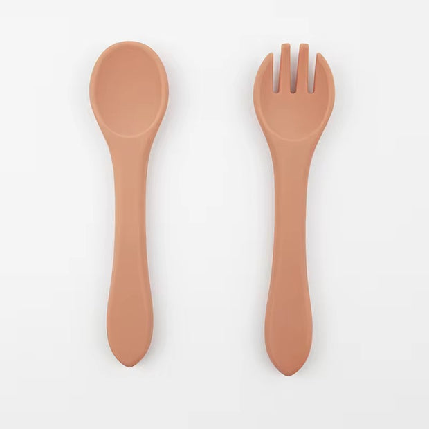 Nibble and Gnaw silicone spoon and fork set in assorted earthy tones, designed for little hands, made from safe, BPA-free, food-grade material, Muted 