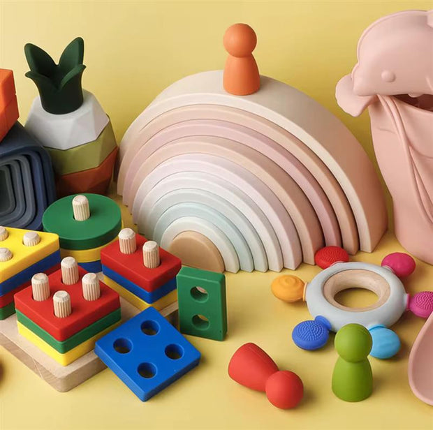A 10-piece silicone stacking rainbow that grows with your child